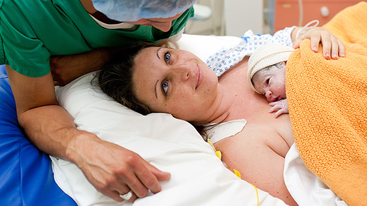 mom and dad in delivery room