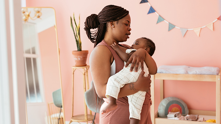 bedtime routine, mom holding baby in  arms