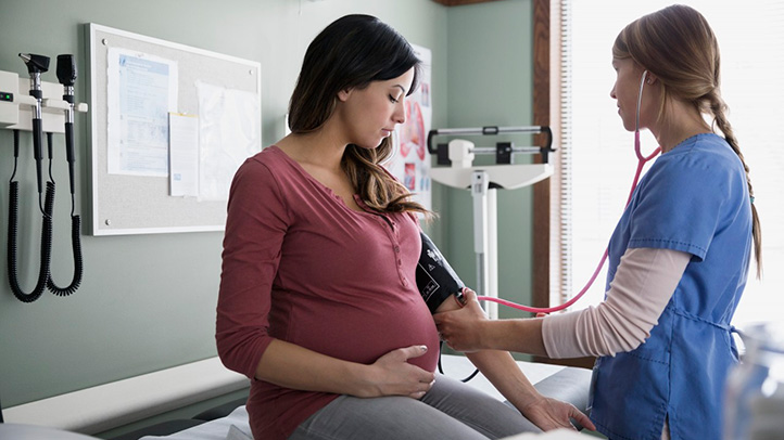 woman with high blood pressure at the doctor