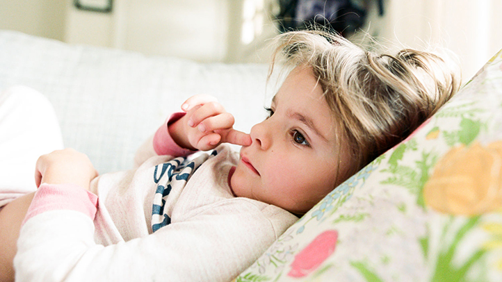 toddler picking his nose